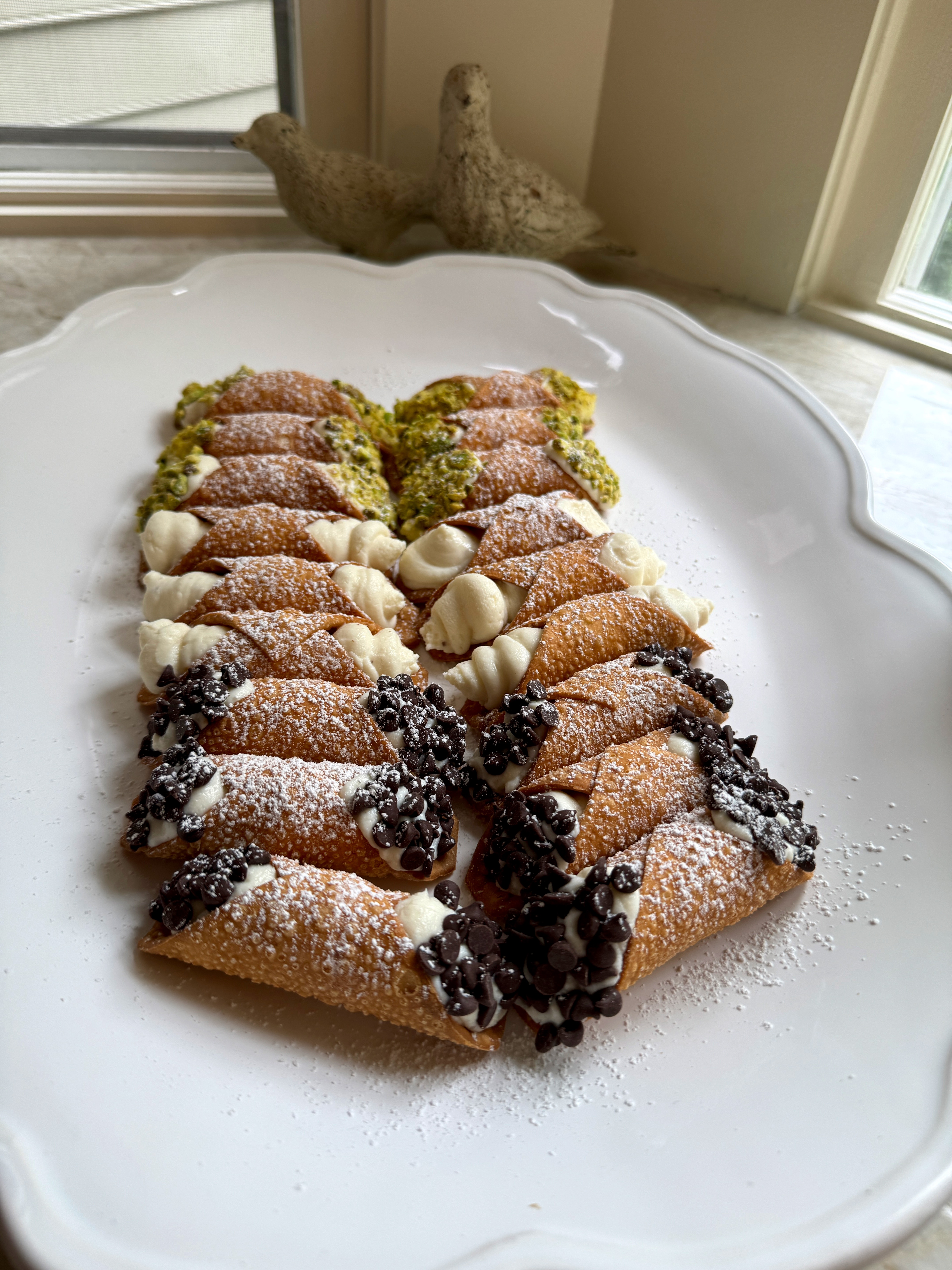 House-made cannoli filled with sweet ricotta cream from Pizzeria Coco