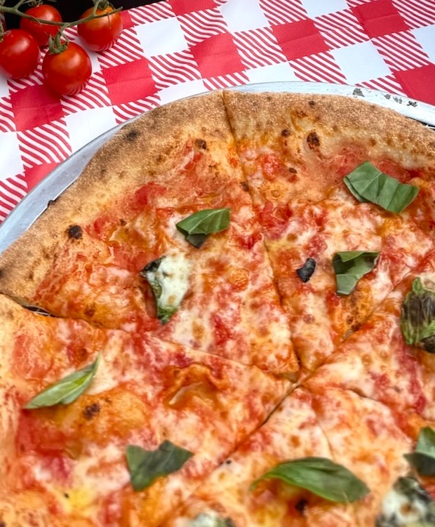 Pizzeria Coco Margherita pizza with tomato, fresh mozzarella and basil