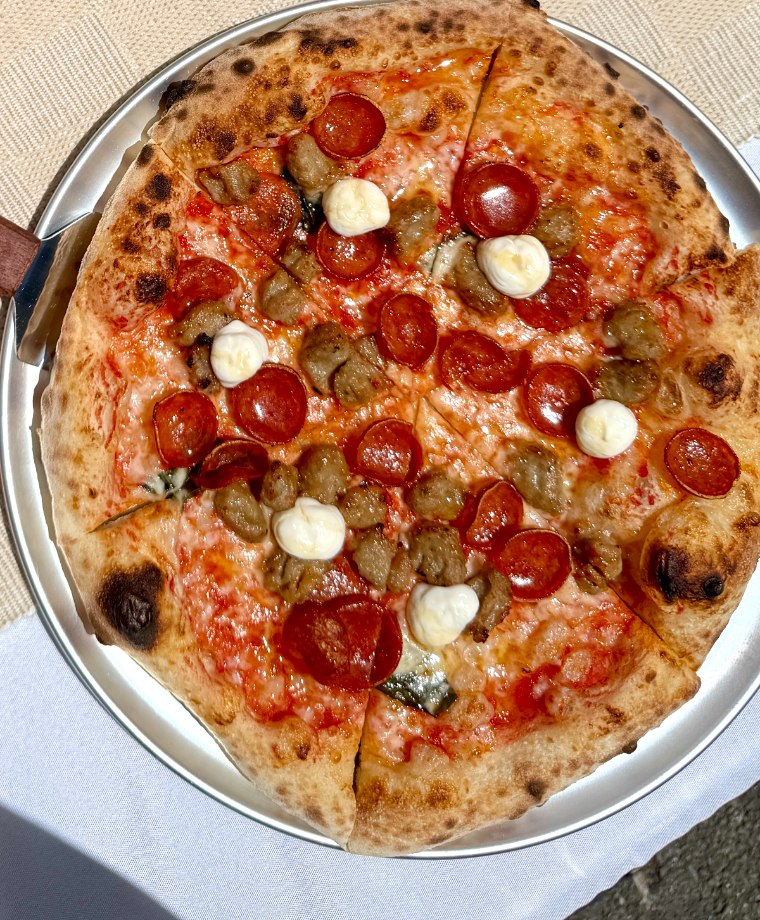 Pizzeria Coco The Metro pizza with pepperoni, sausage, ricotta and hot honey